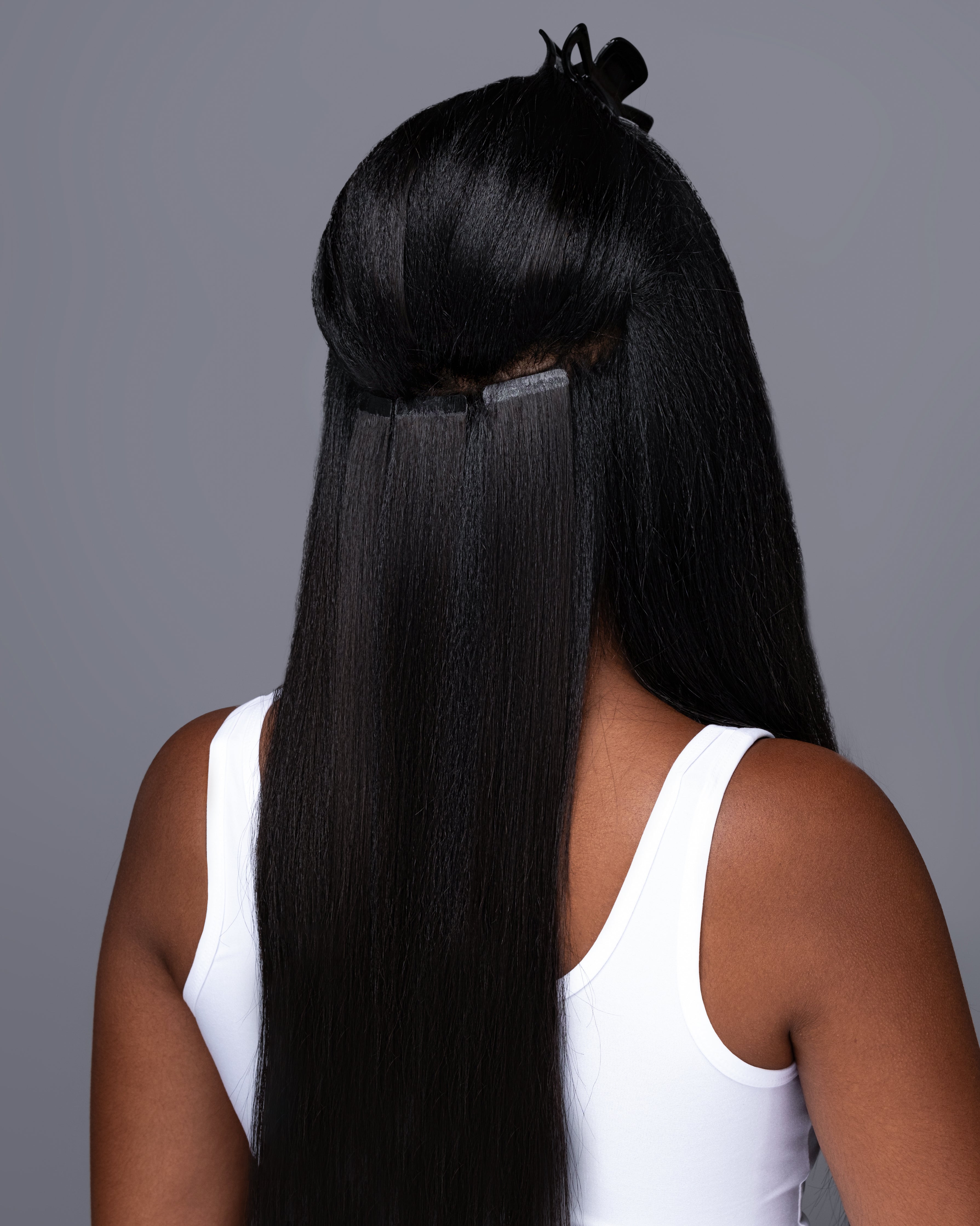 RAW INDIAN BODY WAVE - Tape-In Extensions